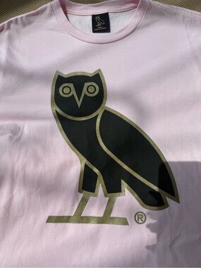OVO Light Pink T-Shirt with Black and Gold Owl Logo